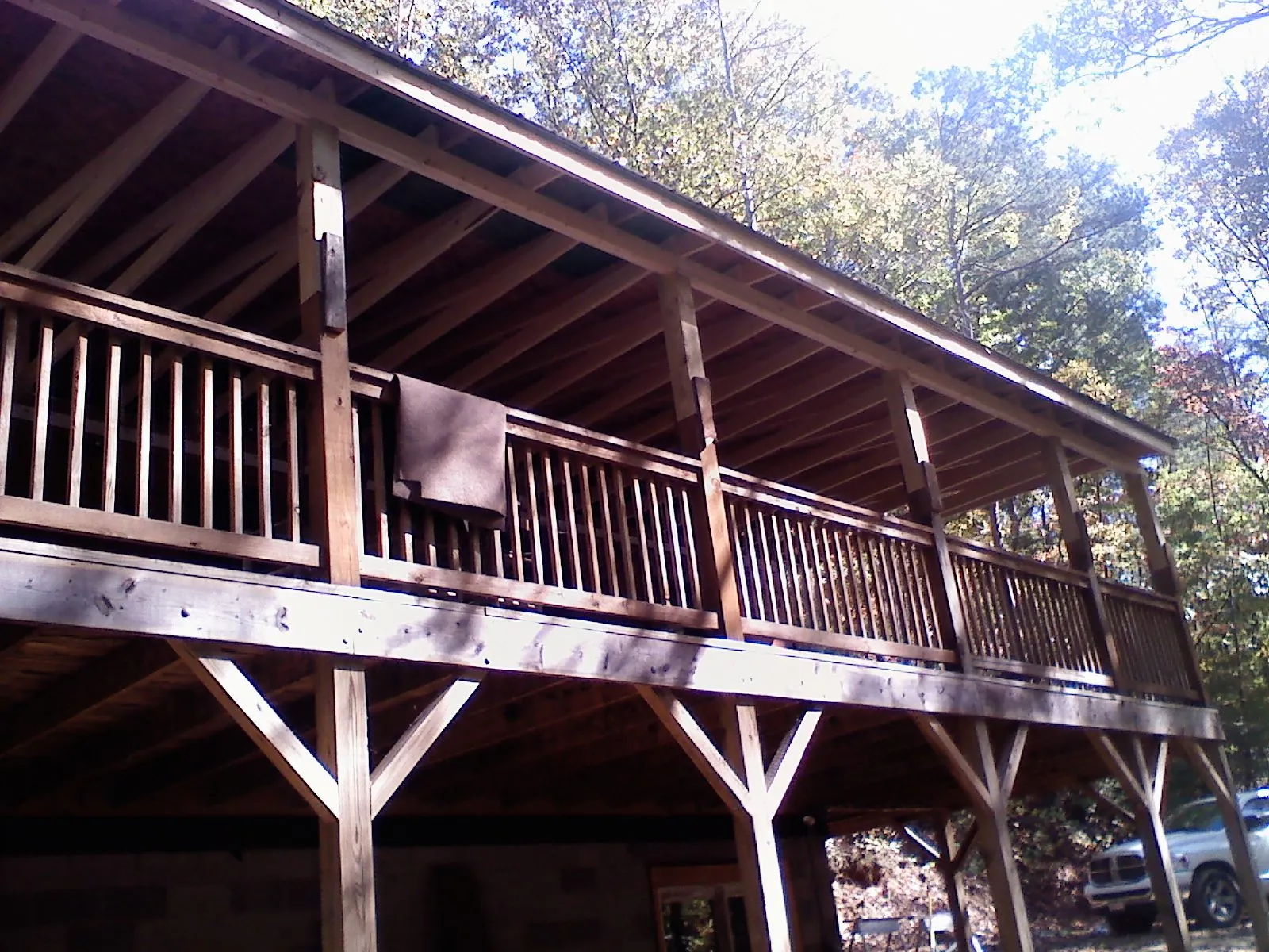 Timber framing under a new elevated porch and deck — Roof Leak Repair in Gig Harbor by Roofing Brothers
